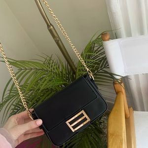 Black crossbody with gold detail